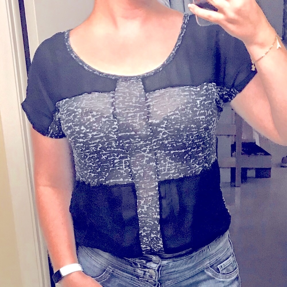 Gray and black top, partially translucent